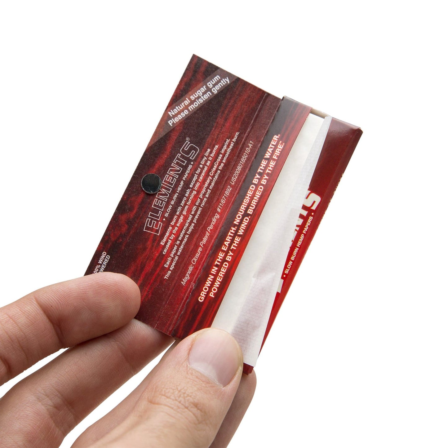 ELEMENTS Red Hemp Rolling Paper King Size Slim in hand