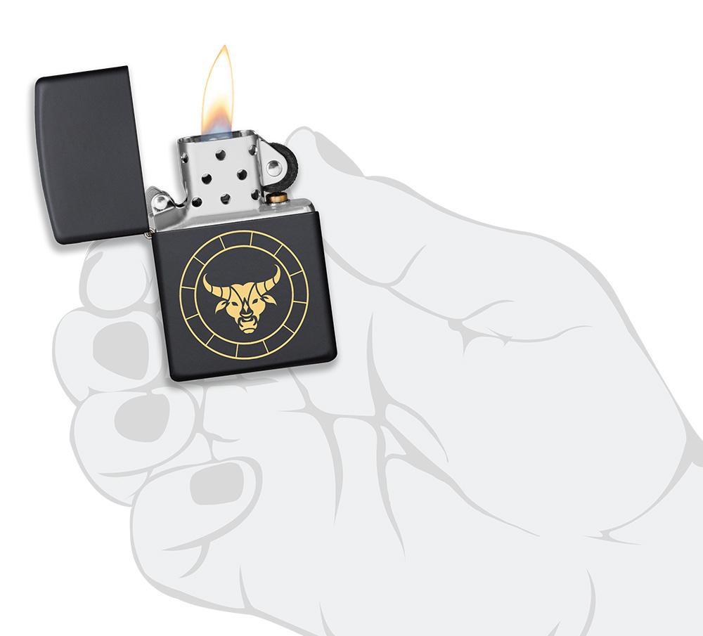 Zippo Lighter - Taurus Zodiac Sign Design in Hand
