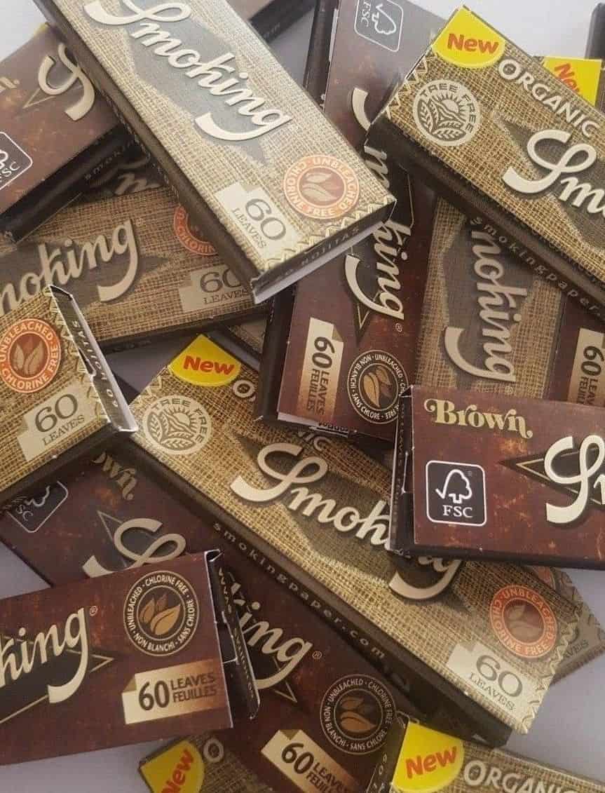 smoking organic rolling paper and smoking brown scattered