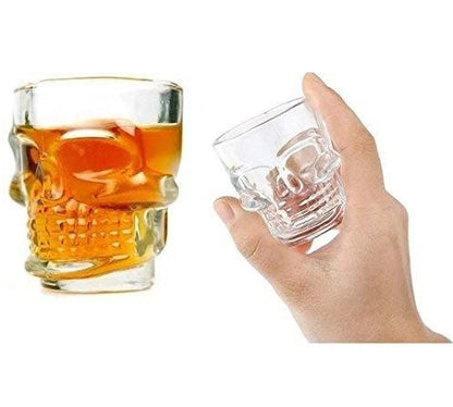 skull head shot glasses in hand