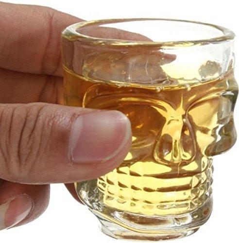 skull shot glass in hand